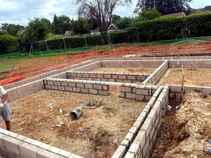 Blockwork foundations being laid on a new build site
