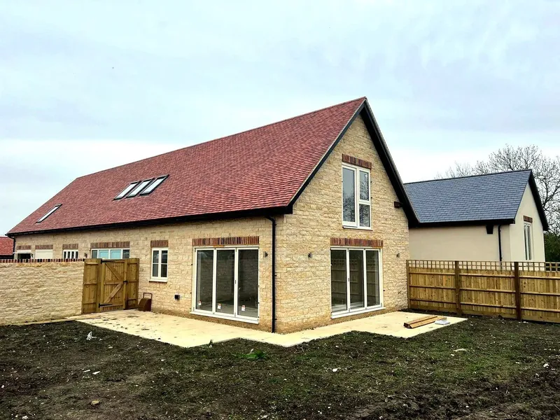 Cotswold stone rear extension with bi-fold doors